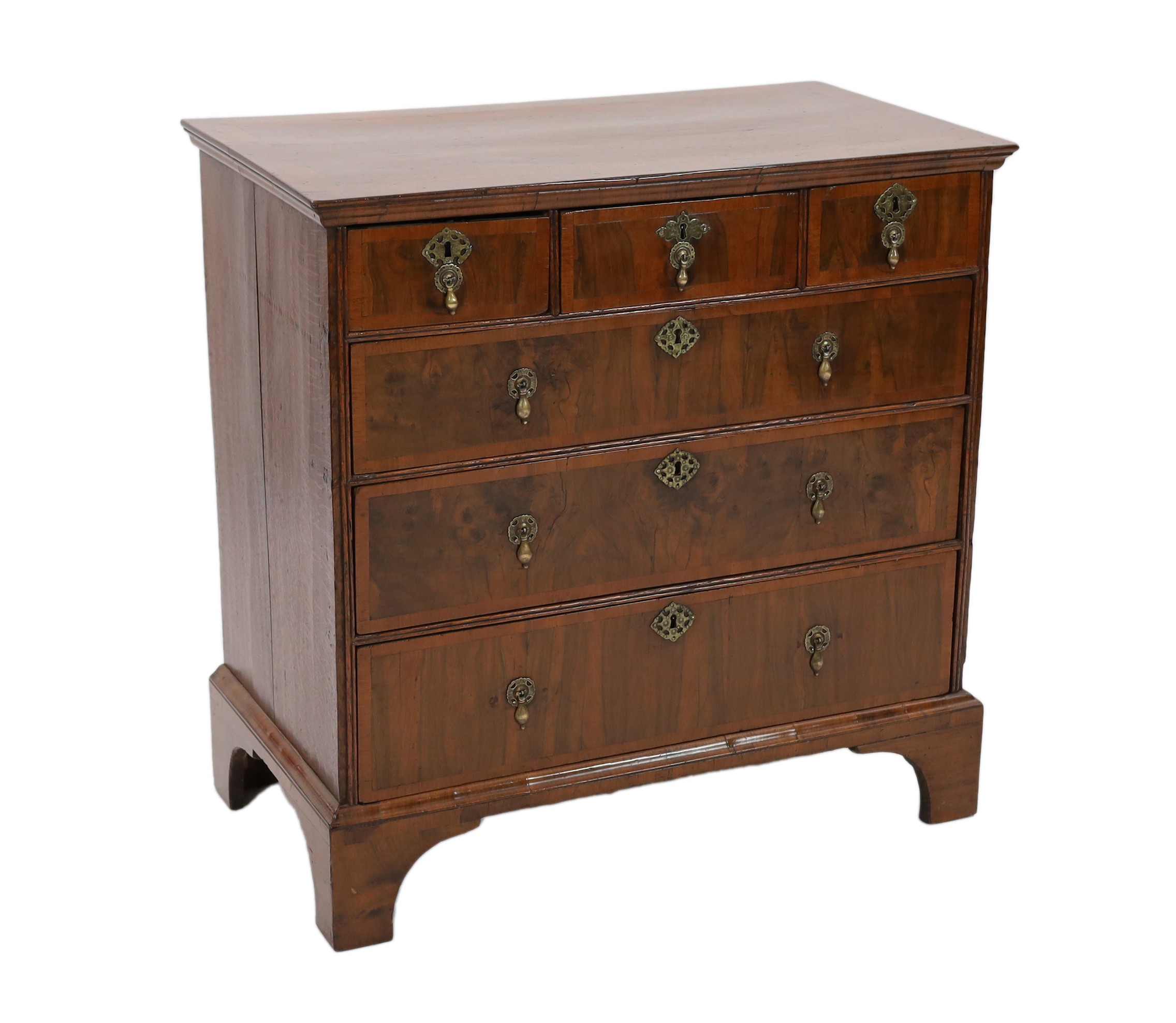 A George I crossbanded walnut chest, width 95cm depth 52cm height 96cm